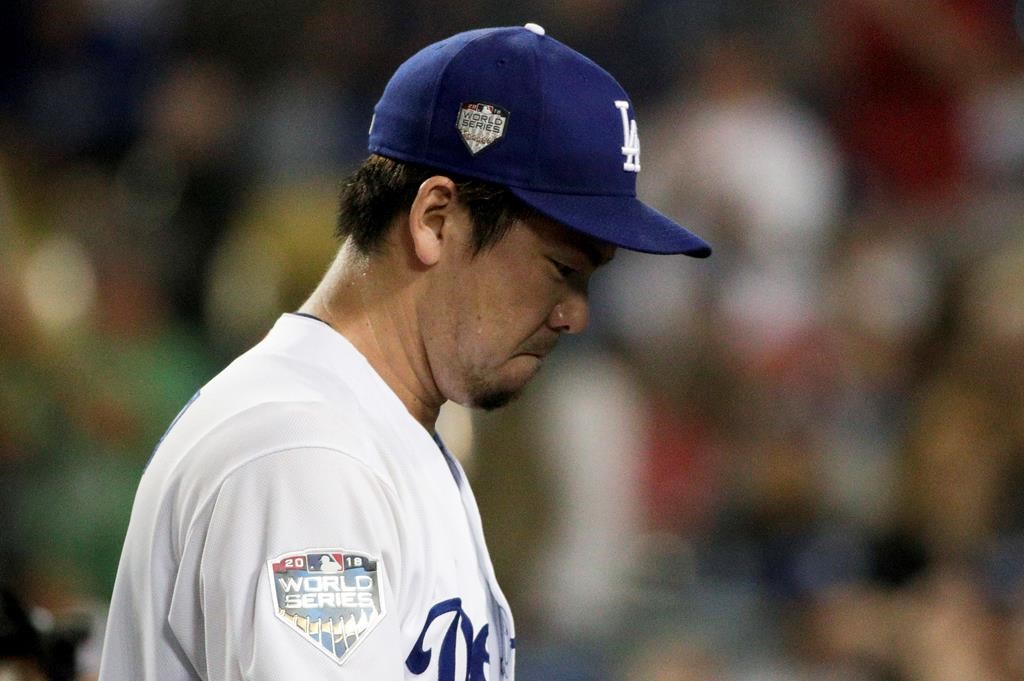 Los Angeles Dodgers pitcher Kenta Maeda leaves the field at the end of the top of the eighth inning against the Boston Red Sox in Game 4 of the World Series on Saturday, Oct. 27, 2018, in Los Angeles. (AP Photo/Jae C. Hong)