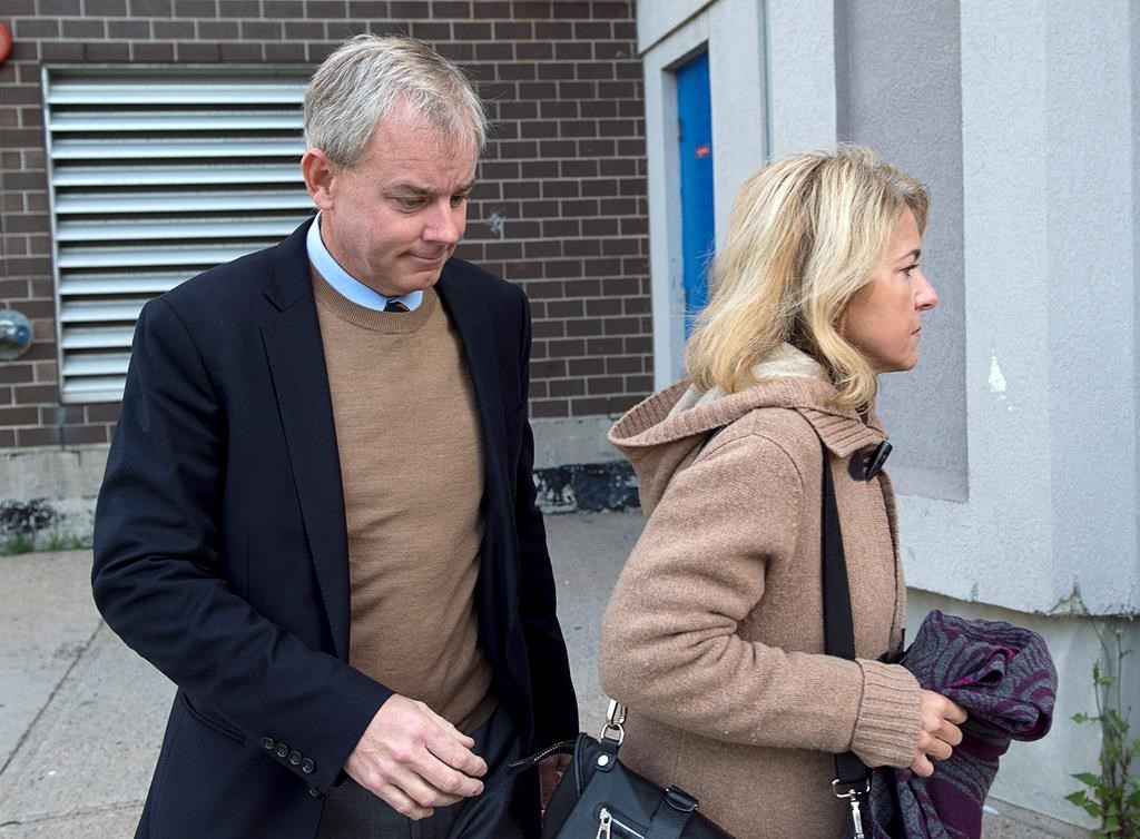 Dennis Oland and his wife Lisa arrive at Harbour Station arena in Saint John, N.B., on Monday, Oct. 15, 2018 for jury selection in the retrial in the bludgeoning death of his millionaire father, Richard Oland.