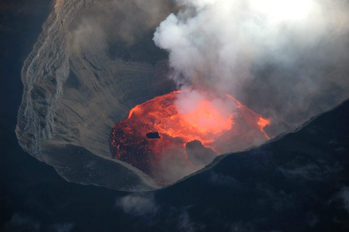 Smoke rises from spewing lava in the crater of the 7,746-foot (2,361-meter) Mount Karthala on Monday, May 29, 2006, on Grand Comore, the largest of the three Comoros islands. Mount Karthala last erupted in April 2005.