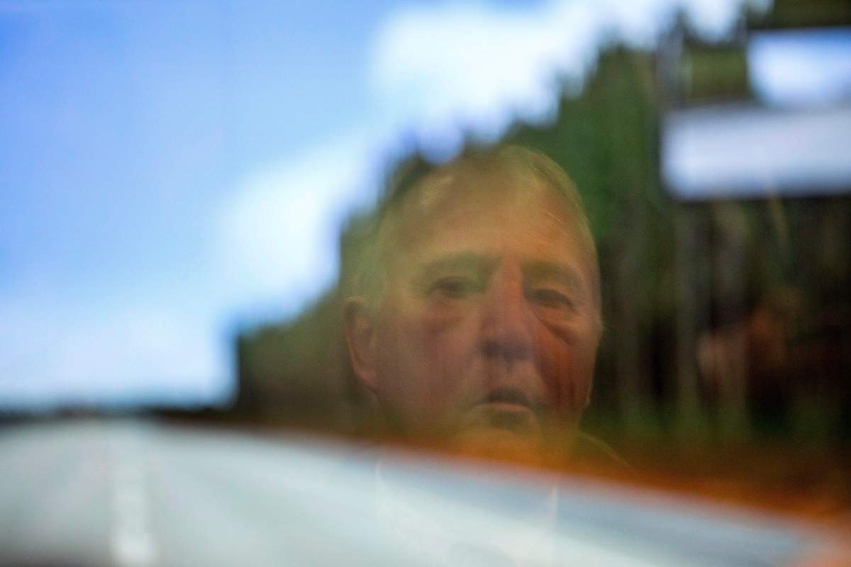 Bill Blair, Parliamentary Secretary to the Minister of Health, is reflected in a screen as he sits a driving simulator meant to simulate the effects of driving under the influence of Cannabis, during a photo opportunity at Centre for Addiction and Mental Health (CAMH) in Toronto on Wednesday January 24, 2018.