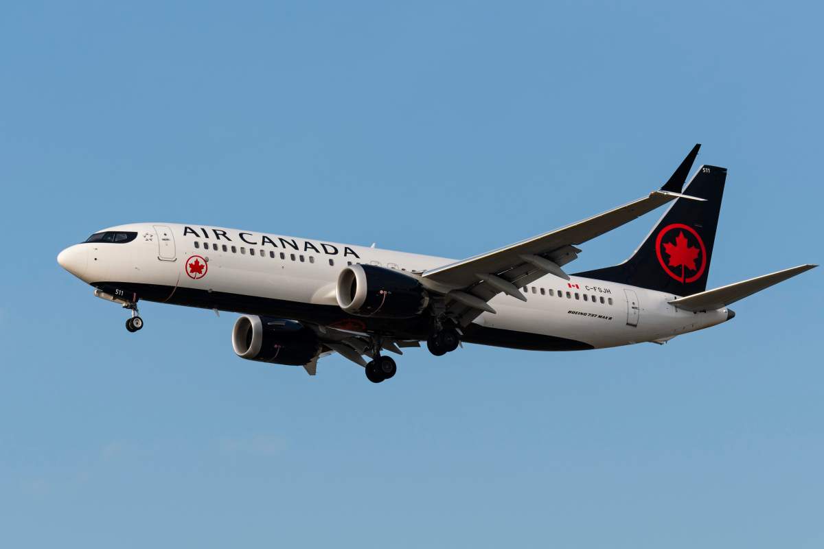 An Air Canada Boeing 737 MAX 8 (C-FSJH) single-aisle narrow-body jet airliner airborne on short final approach for landing at Vancouver International Airport, Richmond, B.C. on Wednesday, August 29, 2018.