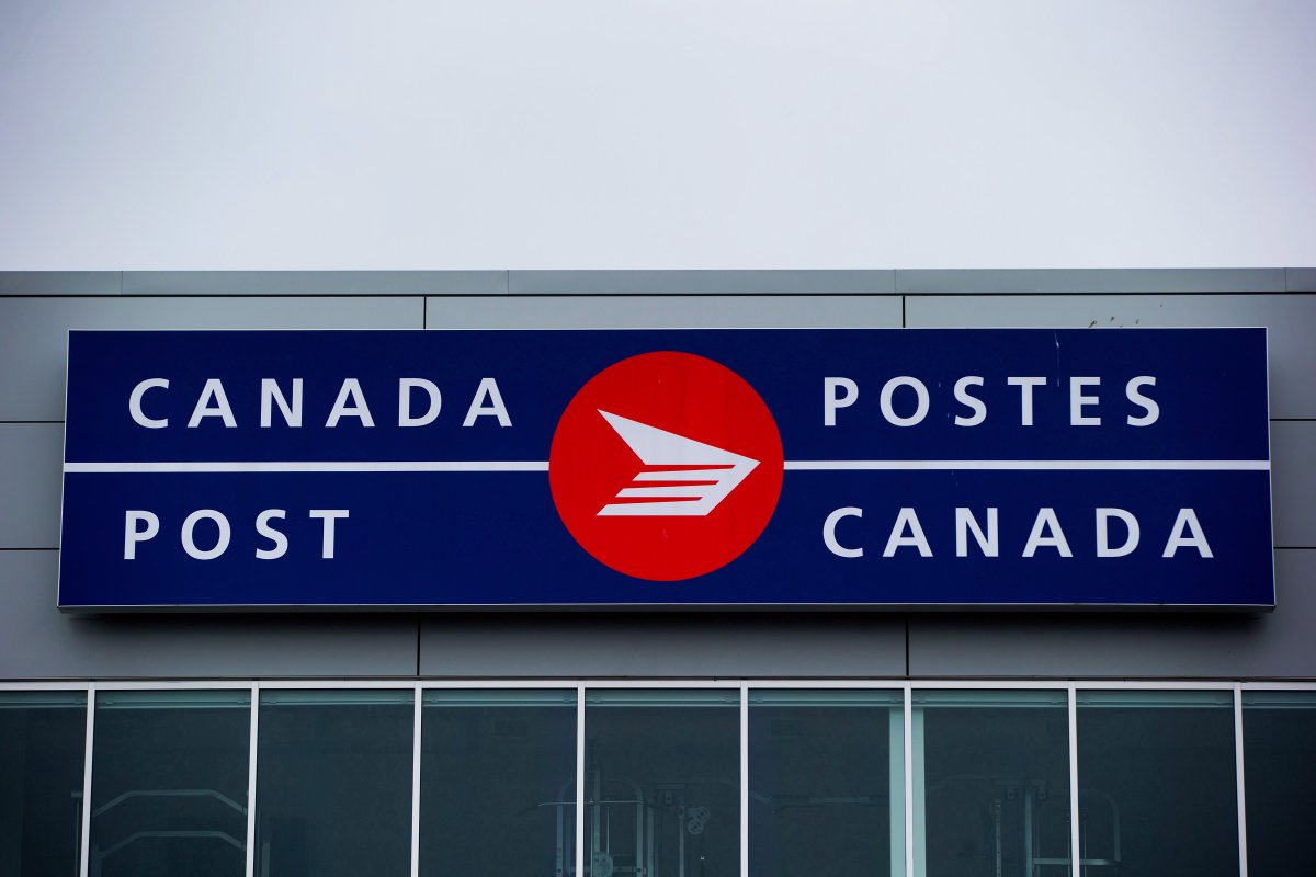 The Canada Post logo is seen on the outside the company's Pacific Processing Centre, in Richmond, B.C., on Thursday June 1, 2017. Manitoba is the latest province to be hit by rotating strikes by members of the Canadian Union of Postal Workers.