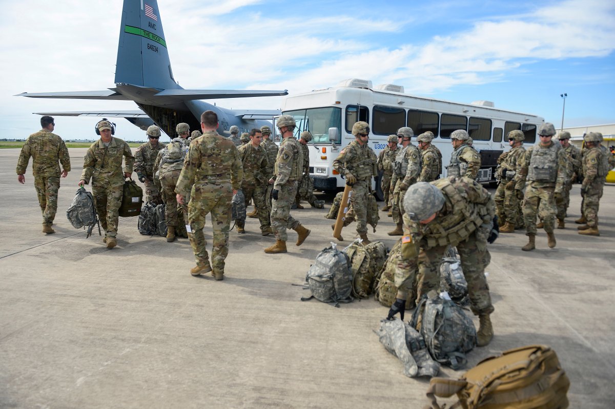 Soldiers from the the 89th Military Police Brigade, and 41st Engineering Company, 19th Engineering Battalion, Fort Riley, Kan., arrive at Valley International Airport, Thursday, Nov. 1, 2018, in Harlingen, Texas, to conduct the first missions along the southern border in support of Operation Faithful Patriot. 