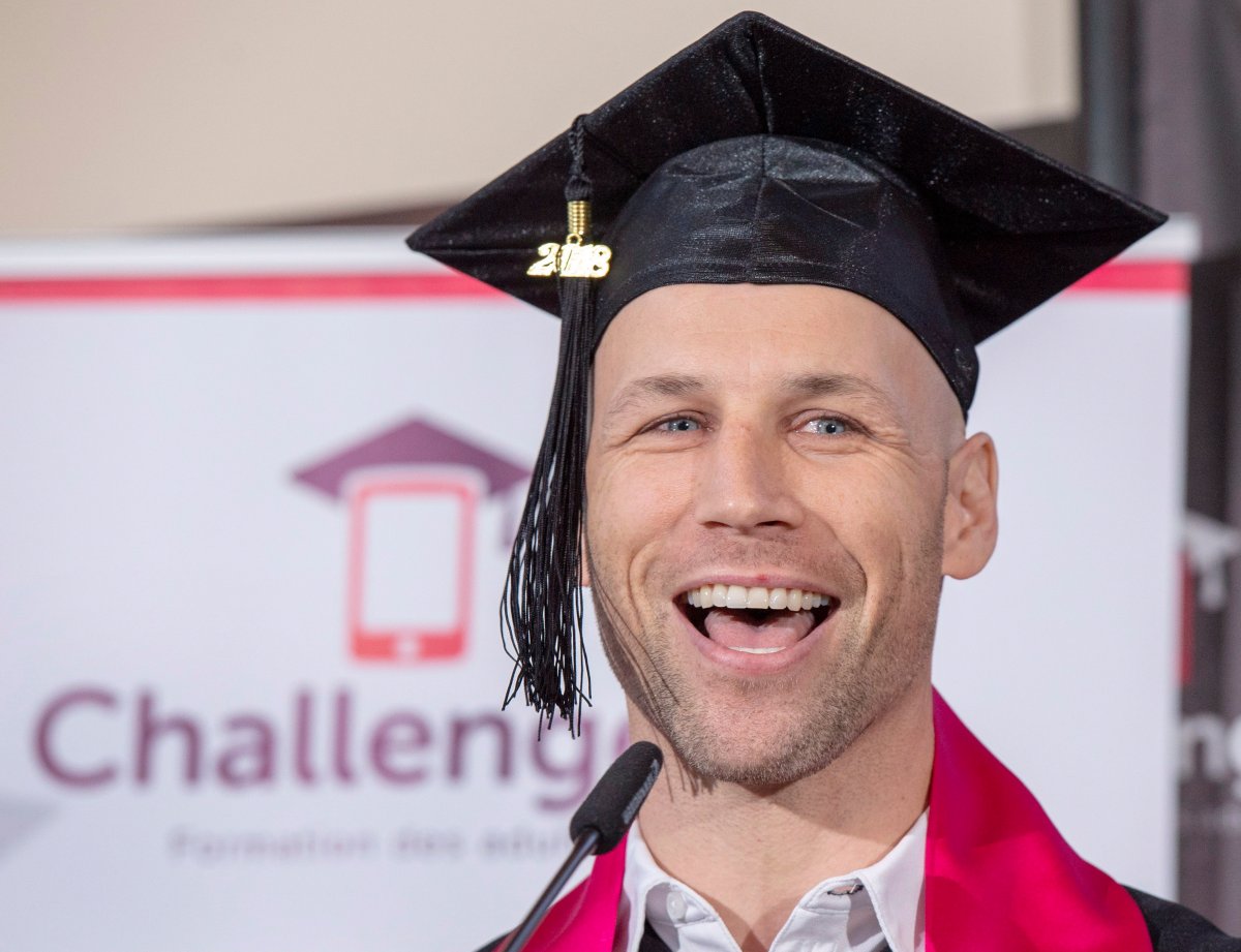 Former Montreal Canadiens player Steve Bégin smiles after receiving his high school diploma Thursday, November 8, 2018 in Montreal. Begin used a new app that allowed him to finish his courses online with his smart phone.