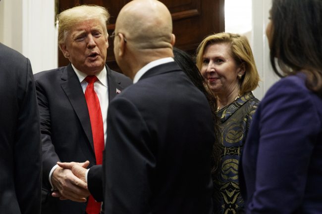 Deputy National Security Adviser Mira Ricardel watches as President Donald Trump arrives for a Diwali ceremonial lighting of the Diya in the Roosevelt Room of the White House, Tuesday, Nov. 13, 2018, in Washington.