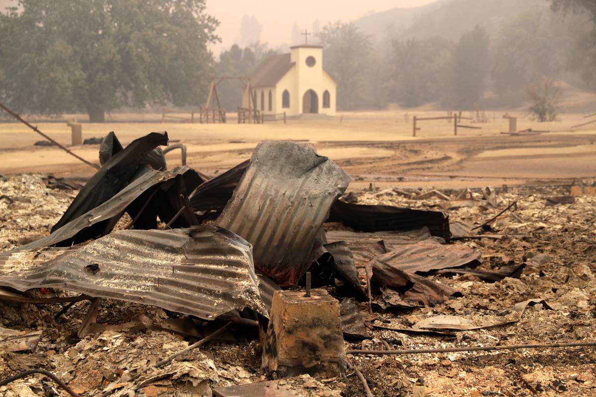 FILE – This Friday, Nov. 9, 2018 file photo shows Paramount Ranch, a frontier western town built as a movie set that appeared in countless movies and TV shows, after it was decimated by the Woolsey fire in Agoura Hills, Calif. Southern Californians faced with the loss of lives and homes in a huge wildfire are also grappling with the destruction of public lands popular with hikers, horseback riders and mountain bikers. The Woolsey fire has charred more than 83 percent of National Park Service land within the Santa Monica Mountain National Recreational Area.