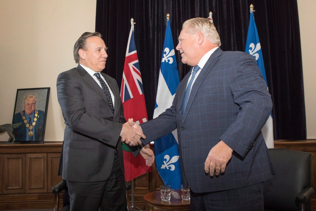 Quebec Premier François Legault, left, meets with Ontario Premier Doug Ford at Queens Park, in Toronto on Monday, Nov. 19, 2018. 