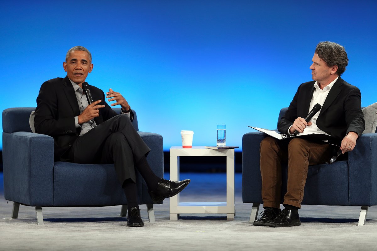 Former U.S. President Barack Obama, left, speaks to author David Eggers during the second Obama Foundation summit at the Mariott Marquis hotel in Chicago on Monday, Nov. 19, 2018. 