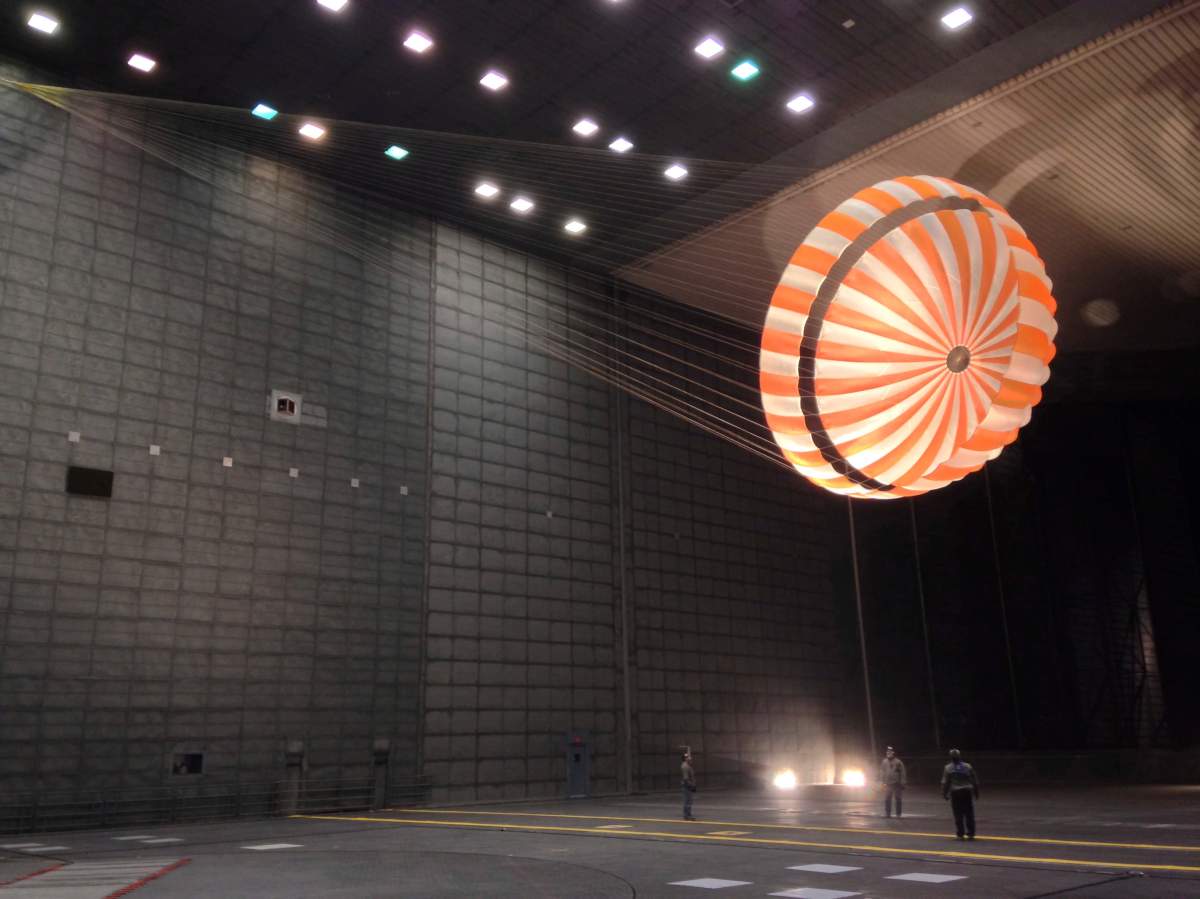 In this February 2015 photo made available by NASA, the parachute for the InSight mission to Mars is tested inside the world’s largest wind tunnel at NASA Ames Research Center in Mountain View, Calif.