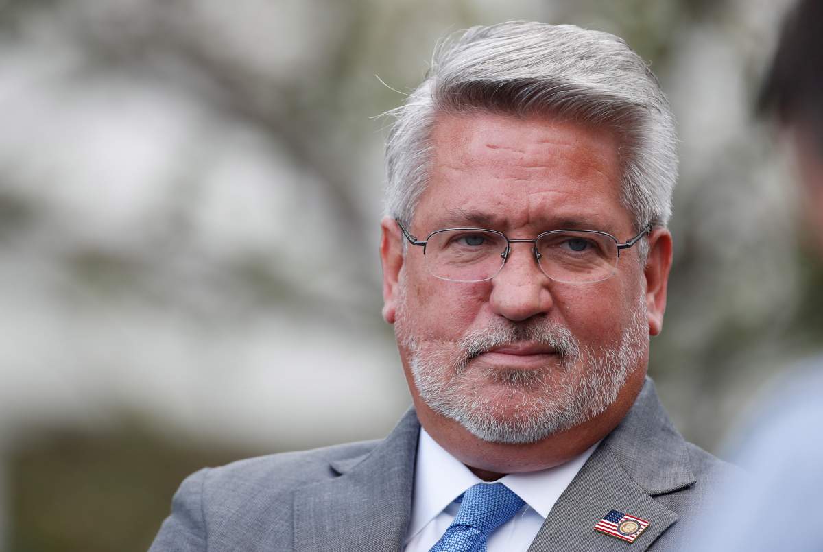 FILE - In this Sept. 20, 2018, file photo, Deputy Chief of Staff for Communications Bill Shine, waits for President Donald Trump to walk to Marine One on the South Lawn of the White House in Washington.