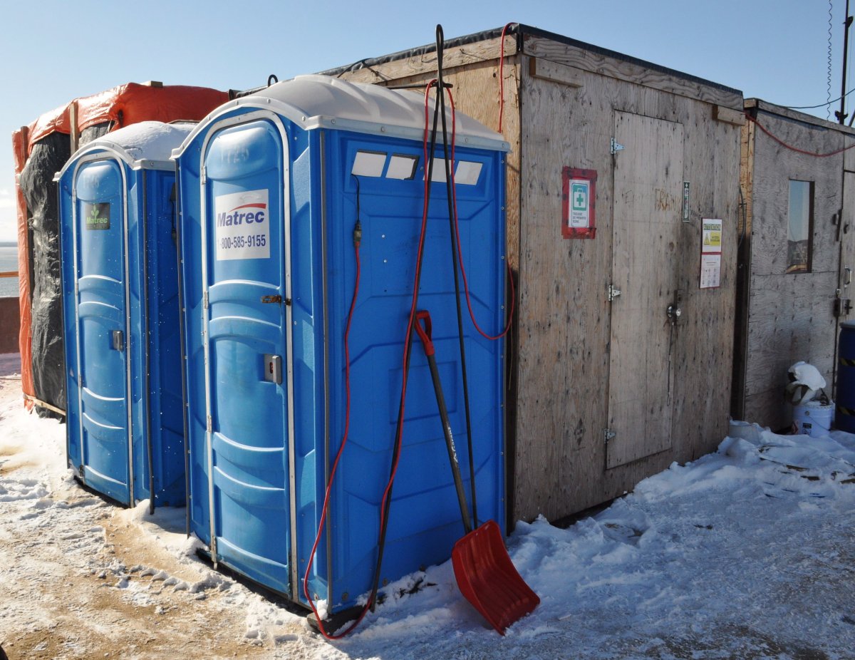 A violation notice was issued this week by Quebec's workplace safety board and the consortium Signature on the St. Lawrence was given until Friday to make sure there are enough portable toilets on the construction site and that they have lighting, are heated, and clean.