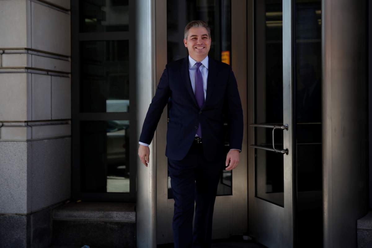 CNN chief White House correspondent Jim Acosta smiles as he departs after a judge temporarily restored Acosta’s White House press credentials following a hearing at U.S. District Court in Washington, D.C.