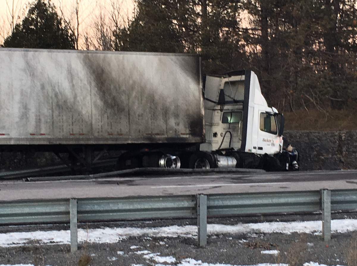 A major collision has closed Highway 401 near Odessa in both directions. THe collision involved a car and a transport truck, shown in this photo.