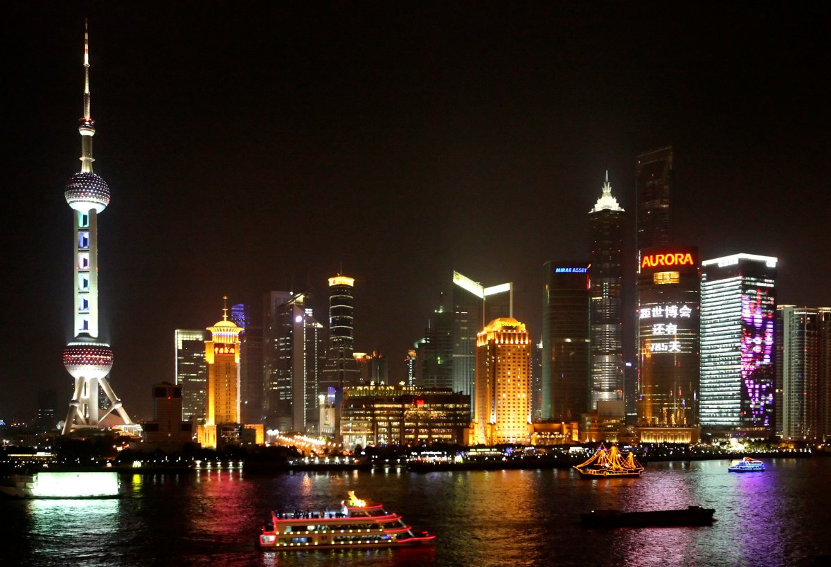 Pudong business district is home of the famous Shanghai skyline, with the Oriental Pearl Tower (L), as seen from "The Bund" in Shanghai, China on March 7, 2008. 