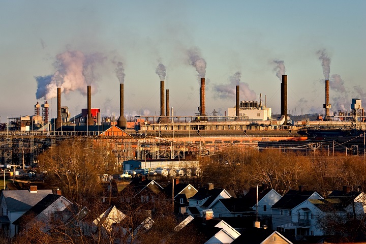 The Rio Tinto-Alcan plant is pictured near a residential area in the Arvida district of Saguenay, 225km North East of Quebec City Wednesday November 10, 2010. A company town, Arvida was planned around the plant so people could walk to it.  Arvida has been declared a heritage site by the province. Sunday, Nov. 25, 2018.