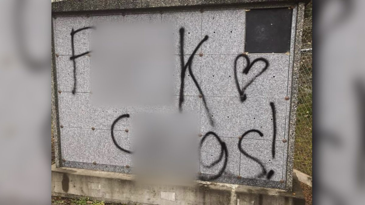 Global News blurred part of a racial slur vandals spray painted on a gravestone at Qualicum First Nation's cemetery.