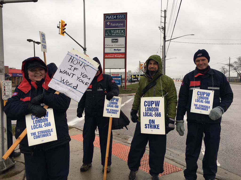 Mail carriers in London are spending the day marching up and down Waterman Ave, off Wellington Road, where Postal Depot 5 is located.