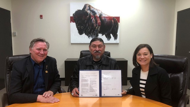 Alberta Parks and the Piikani Nation have signed an agreement to protect indigenous rights in the Castle Parks. (Left to Right) Indigenous Affairs Minister Richard Feehan, Piikani Chief Stanley Grier, Environment Minister Shannon Phillips.