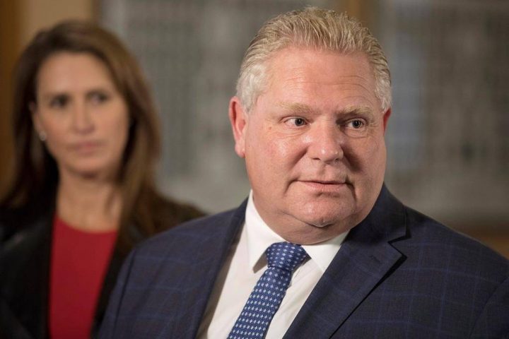 Minister of Francophone Affairs Caroline Mulroney, left, looks on as Ontario Premier Doug Ford speaks to media following his meeting with Quebec Premier Francois Legault , not shown, at Queens Park, in Toronto on Monday, Nov. 19, 2018.