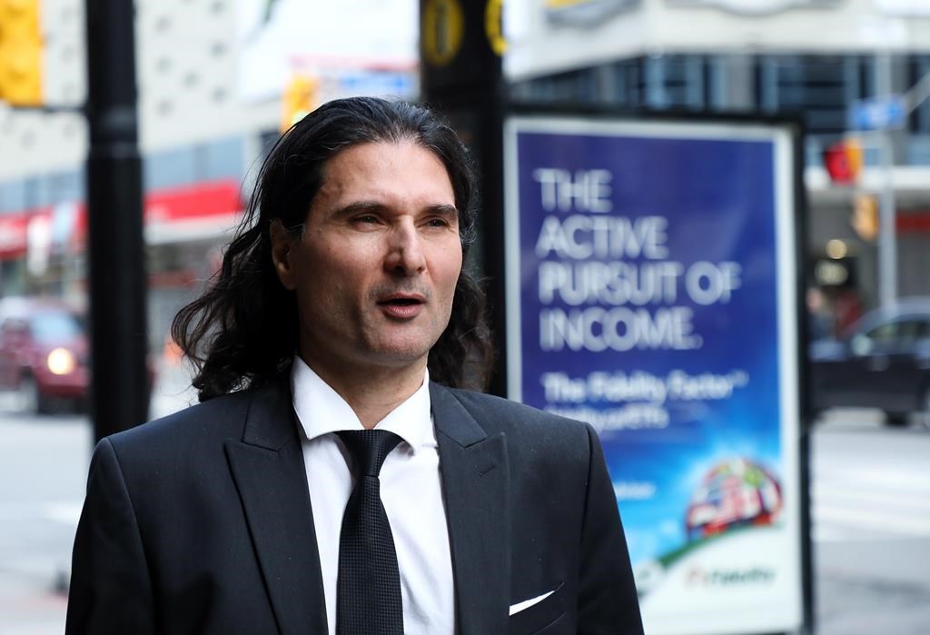 James Sears, editor in chief of "Your Ward News," is seen outside Ontario court in Toronto on Wednesday, Nov. 28, 2018. Sears is charged with willfully promoting hatred of women and Jews. THE CANADIAN PRESS/Colin Perkel.