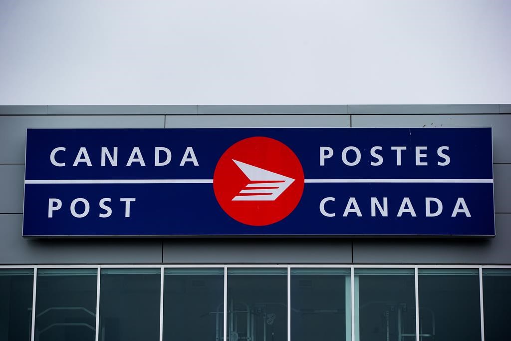 The Canada Post logo is seen on the outside the company's Pacific Processing Centre, in Richmond, B.C., on Thursday June 1, 2017. THE CANADIAN PRESS/Darryl Dyck.