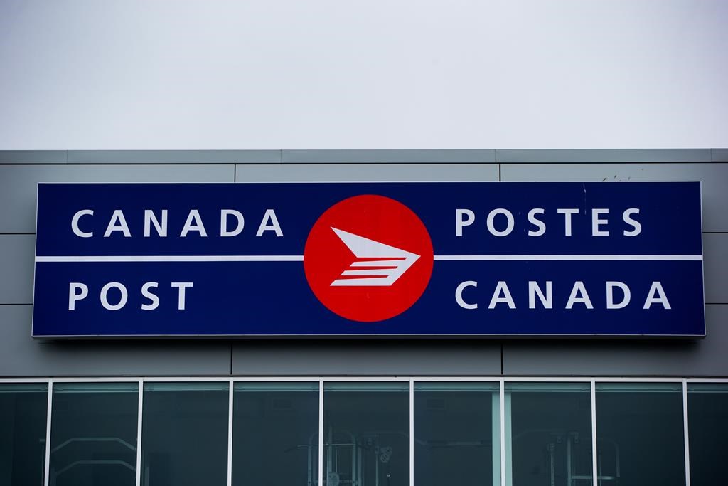 The Canada Post logo is seen on the outside the company's Pacific Processing Centre, in Richmond, B.C., on Thursday June 1, 2017. THE CANADIAN PRESS/Darryl Dyck.
