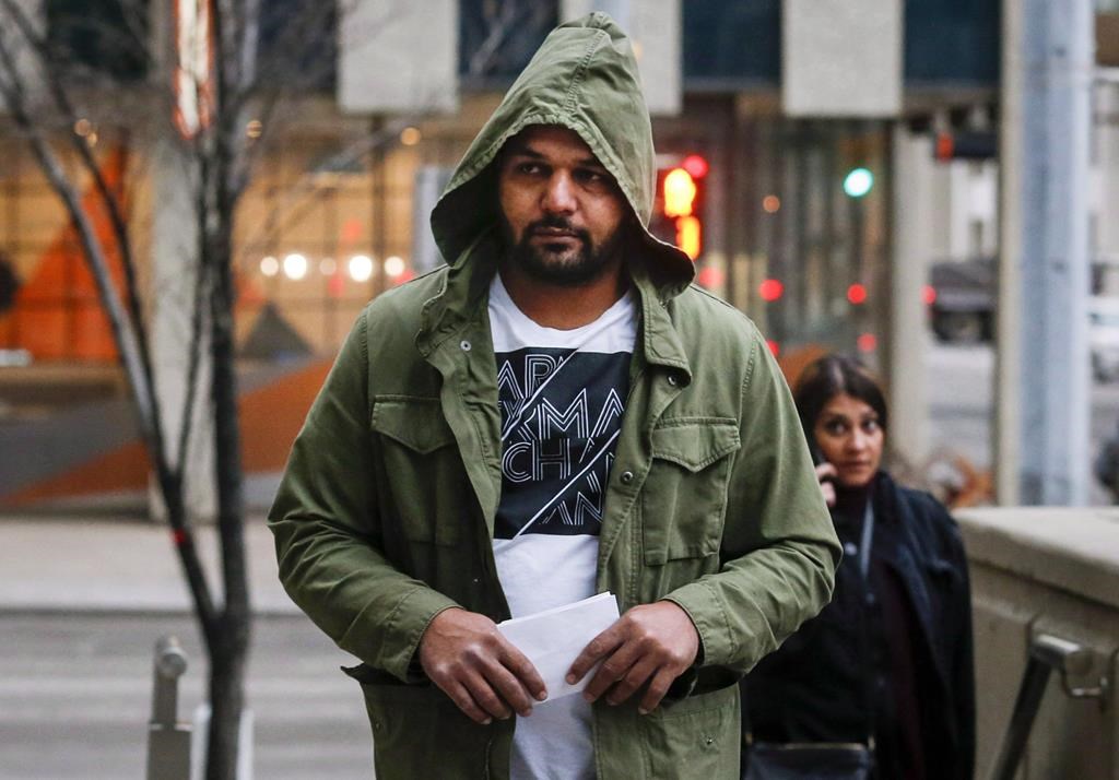 Sukhmander Singh, owner of the trucking company involved in the Humboldt Broncos bus crash, arrives at court to face non-compliance charges under federal and provincial safety regulations in Calgary on November 9, 2018. The case of an owner of a trucking company involved in the fatal Humboldt Broncos bus crash has been adjourned until the New Year. Sukhmander Singh of Adesh Deol Trucking has now retained a lawyer who asked that the matter be set over until Feb. 4. THE CANADIAN PRESS/Jeff McIntosh.