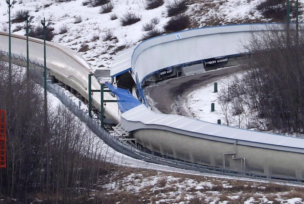 A tarp covers the intersection of the bobsled and luge tracks at Canada Olympic Park in Calgary on February 6, 2016. Jordan and Evan Caldwell, who were 17, were part of a larger group that snuck onto the grounds of the WinSport facility with plastic sleds and headed down the icy track.