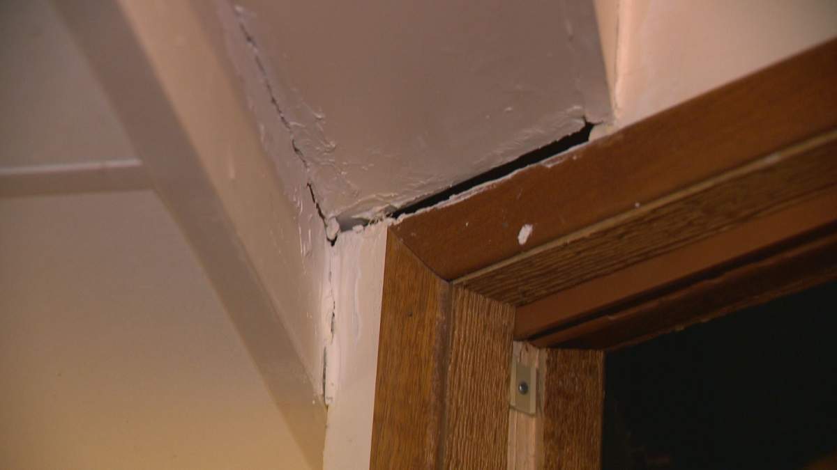 One of many cracks in and around doorways in Lloyd Rogina’s home.