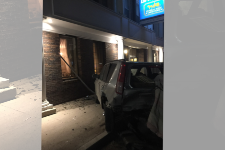 A vehicle crashed  into the front of a local funeral home. 
