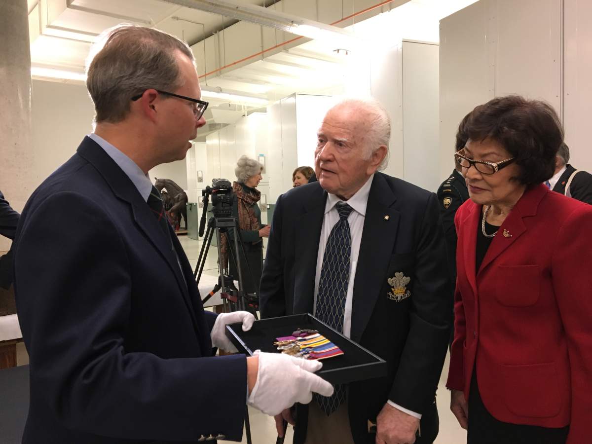 Cyril Woods (centre) is a founding member of the Hill 70 Memorial Foundation and was instrumental in acquiring the Victoria Cross for the museum.