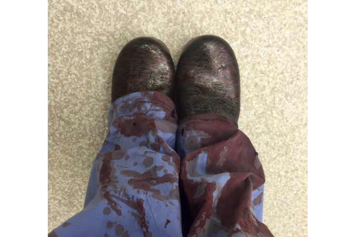 This image recently tweeted by Dr. Kirstin M. Gee, shows her posing in her blood stained scrubs after treating a patient related to gun violence on Oct. 11, 2016. 
