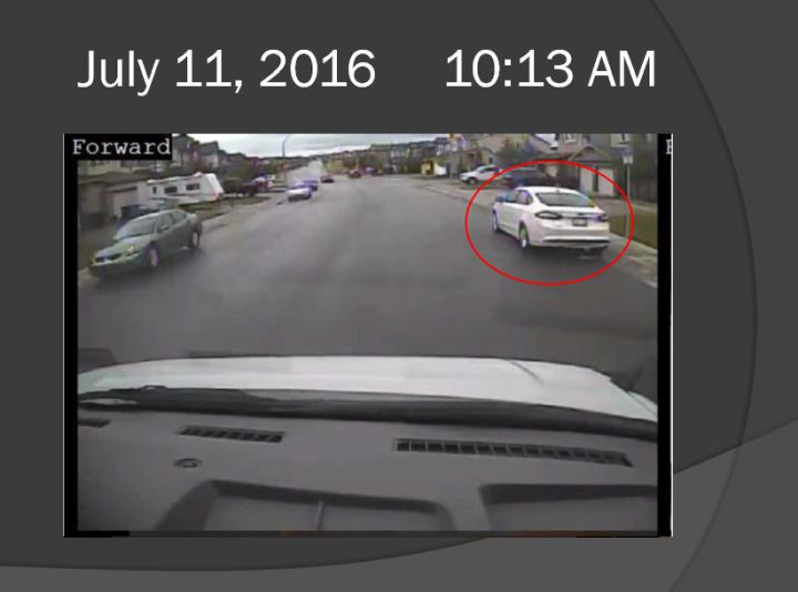 A picture shown in court Thursday, Nov. 29, 2018 shows a white Ford Focus in front of Sara Baillie’s house at 10:13 a.m. July 11, 2016.