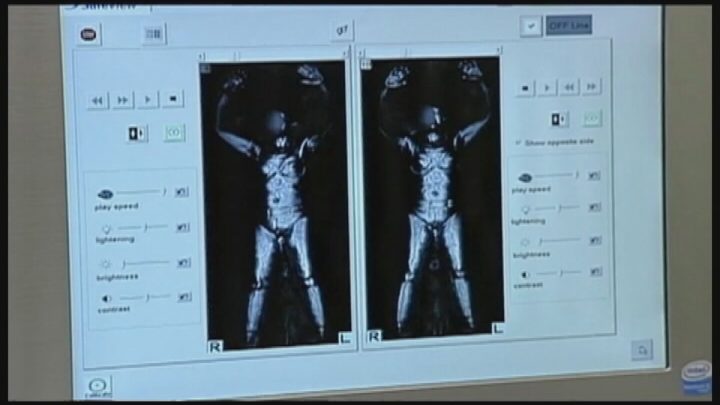 An image of a body scanner in use.