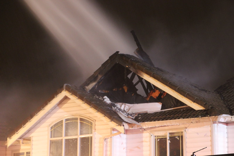 The fire caused the home’s roof to partially collapse.