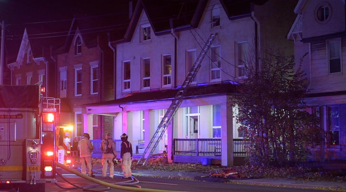 A man had to be rescued from the third floor of a building on fire in Hamilton.