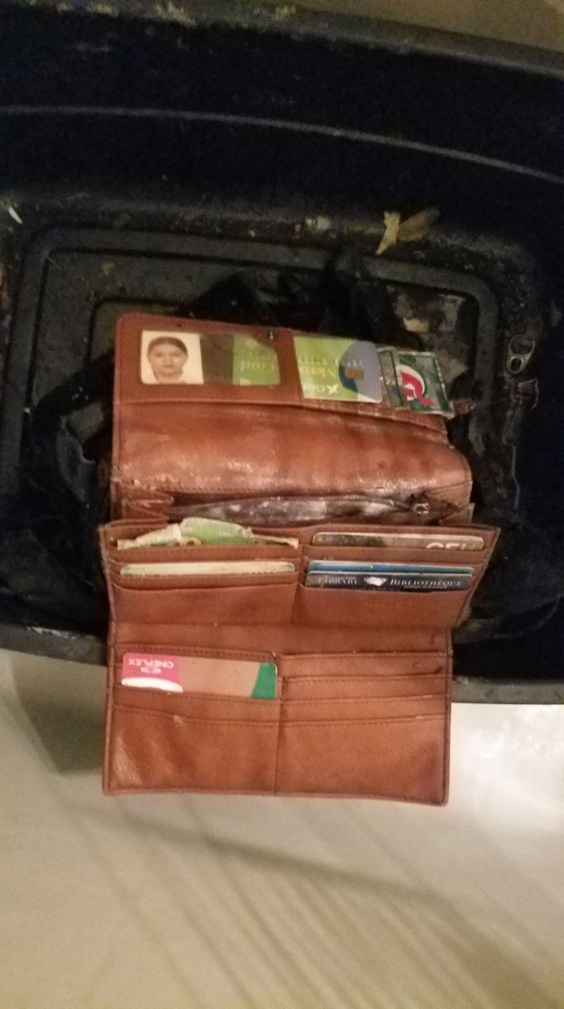 The wallet found inside the bag contained many cards, along with an ID.