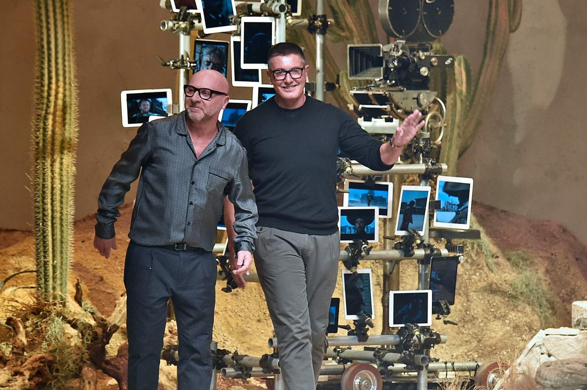 Fashion designers Domenico Dolce and Stefano Gabbana walk the runway at the Dolce & Gabbana show during Milan Men's Fashion Week Fall/Winter 2016/17 on Jan. 16, 2016 in Milan, Italy.