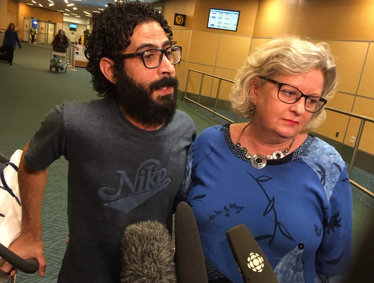 Hassan Al Kontar arrives at the Vancouver International Airport Monday night. Credit: Chris Allard / Global News