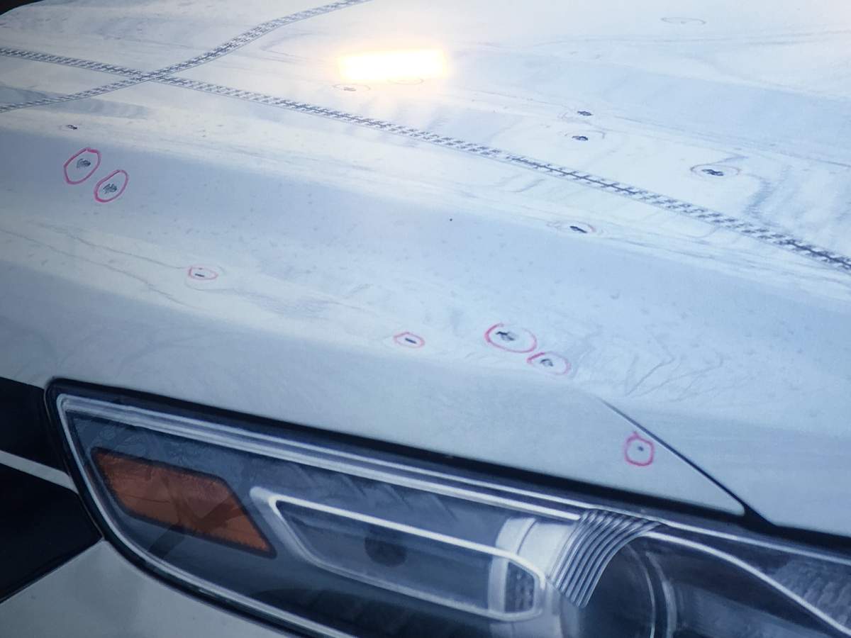 Bullet holes in one of the Winnipeg police cruisers.