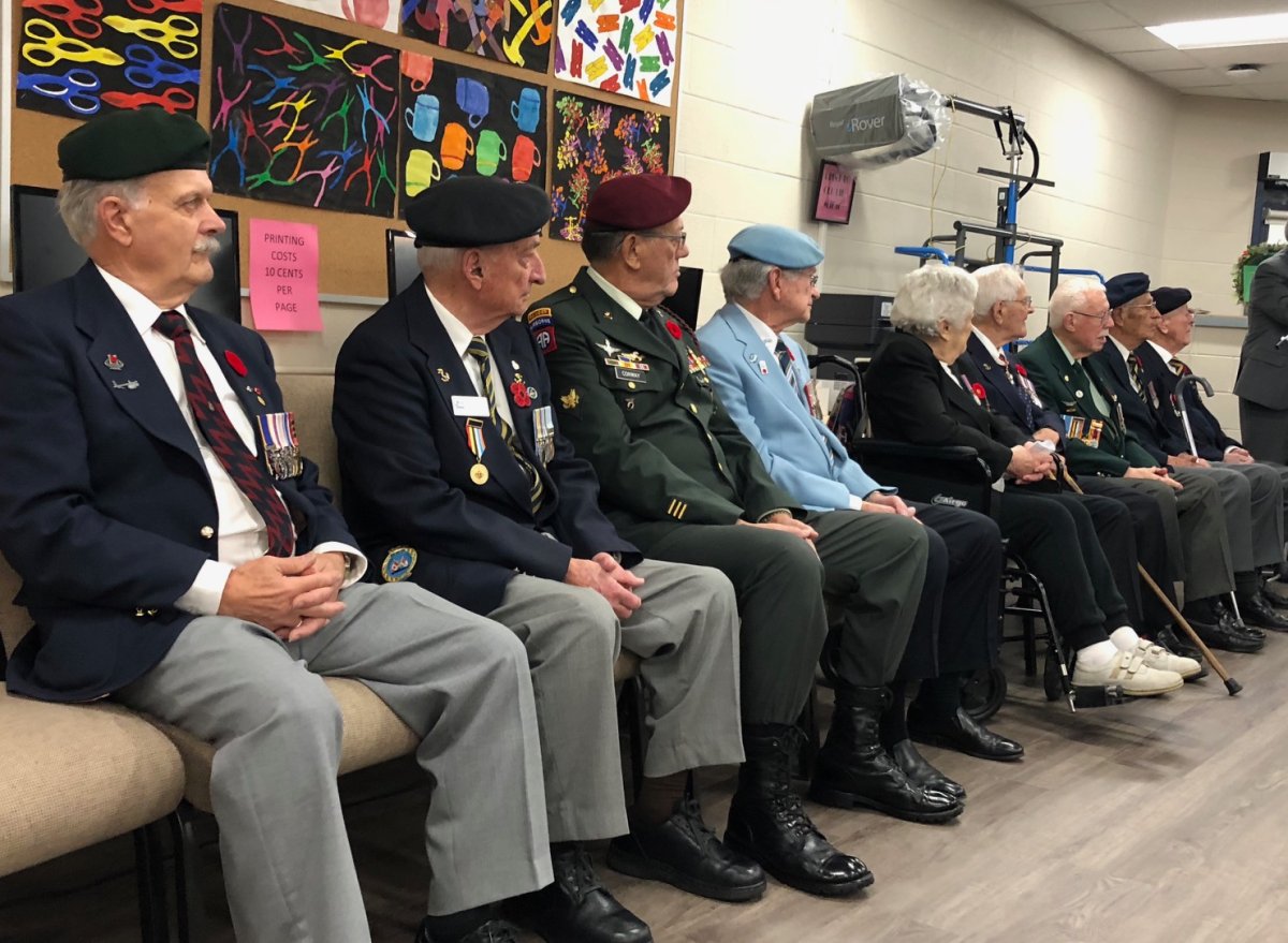 Guelph veterans spoke with students at Our Lady Of Lourdes Catholic High School on Wednesday.