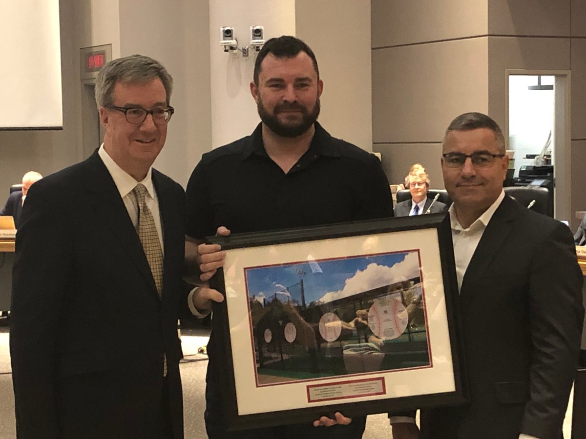 Jody Mitic (centre) was elected councillor for Innes ward in 2014. He has been on leave from council for most of this year due to personal challenges and did not run for re-election. Ottawa Mayor Jim Watson (left) and city manager Steve Kanellakos (right) recognized Mitic for his public service during the final city council meeting of the term on Nov. 28, 2018.