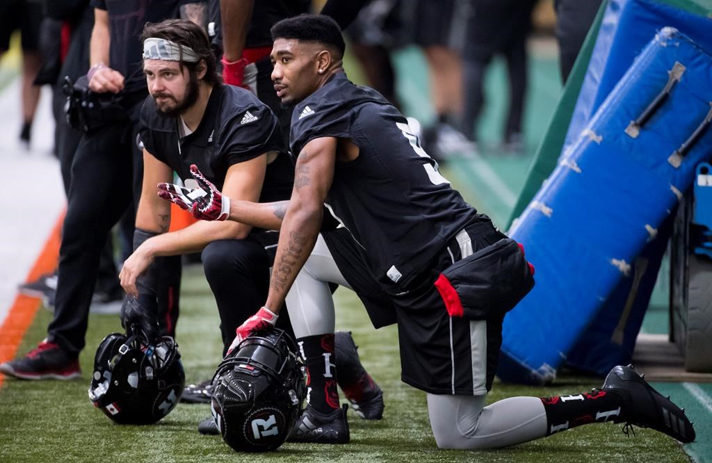 Ottawa Redblacks defensive back Jonathan Rose (9) speaks with teammate defensive back Antoine Pruneau (6) during a team practice in Edmonton, Wednesday, Nov. 21, 2018. The 106th Grey Cup will be played Sunday between the Ottawa Redblacks and the Calgary Stampeders. THE CANADIAN PRESS/Jonathan Hayward.
