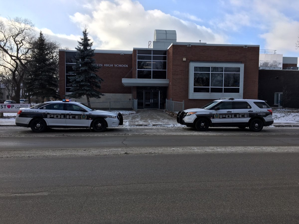Police at the scene of Kelvin High School.