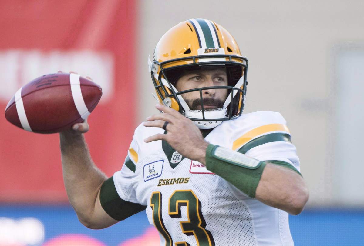 Edmonton Eskimos quarterback Mike Reilly throws a pass during first half CFL football action against the Montreal Alouettes in Montreal on July 26, 2018.