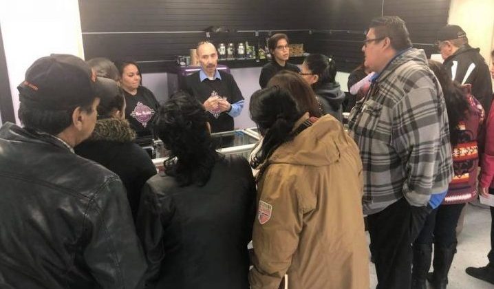 Mino-Maskihki staff speak with customers on the Muscowpetung First Nation. The doors to Mino-Maskihki opened to the public on Nov. 14, 2018.