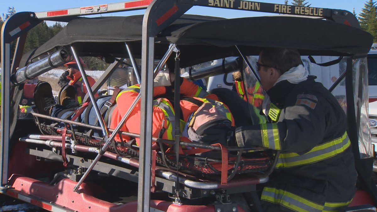 A Brunswick Pipeline employee is treated by Saint John first responders as part of a mock emergency exercise.