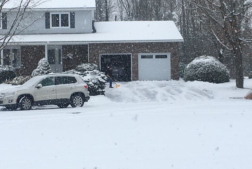 Several Fredericton residents could be seen outside shoveling their driveways and sidewalks following Monday night’s snowfall.