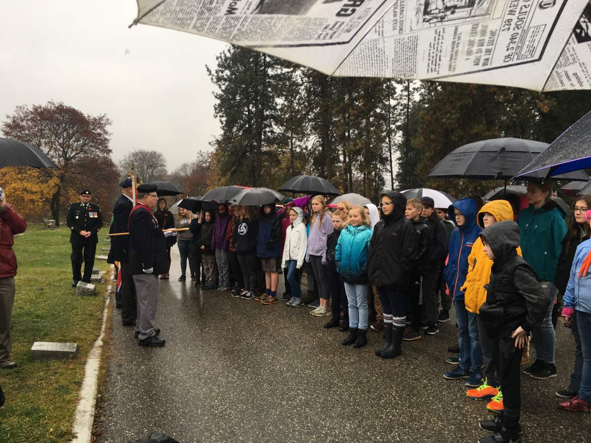 Students from Harwood and Beairsto elementary schools join the B.C. Dragoons and the Royal Canadian Legion, Branch 25 for the No Stone Left Alone ceremony in Vernon.