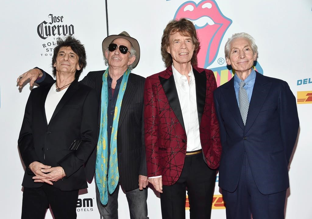 FILE - In this Nov. 15, 2016 file photo, The Rolling Stones, from left, Ronnie Wood, Keith Richards, Mick Jagger and Charlie Watts attend the opening night party for "Exhibitionism" in New York. The Rolling Stones will be rolling through the U.S. next year. The band says it is adding a 13-show leg to its No Filter tour in spring 2019, kicking off in Miami on April 20.